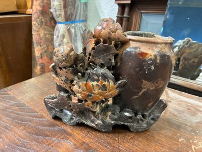 a vase that is sitting on a table in a room
