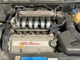 a picture of a car engine with its hood open