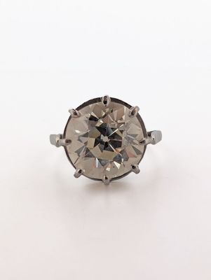 a diamond ring on a white background