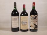 trois bouteilles de vin posées sur une table