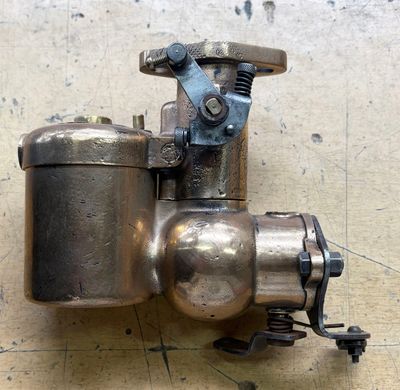 a metal pipe that is attached to the side of a wall