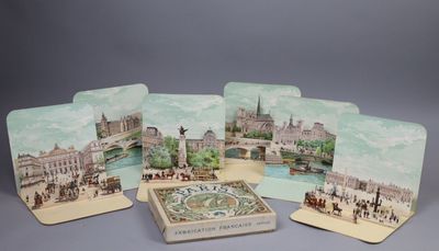 quatre sous-verres avec l'image d'une ville et d'un pont