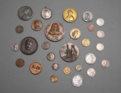 a lot of coins that are on the table
