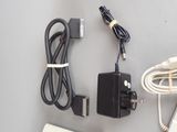 a computer mouse and a charger on a table