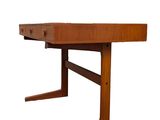 a close up of a wooden table with a drawer on it