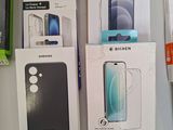 boxes of various cell phones are sitting on a table next to each other