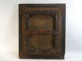 an old wooden picture frame with a window in it