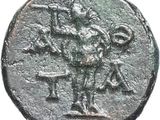 a close up of a coin with a man on it