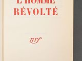 an open book with the title l ' homme revolution written on it