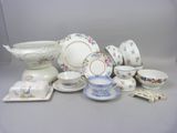 many different types of china on display on the table