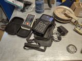 a table with a cell phone and other items on it