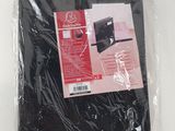 a bag of black plastic material on a white surface