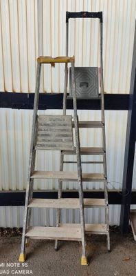 a ladder that is leaning against a wall