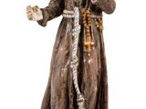 figurine of st francis of assisi on a book