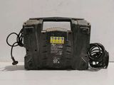 an image of a portable air compressor sitting on top of a table