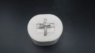 a close up of a ring sitting on top of a white box