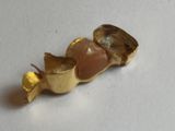 a small piece of food that is sitting on a table