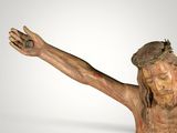 an image of a wooden statue of jesus with a crown of thorns on his head