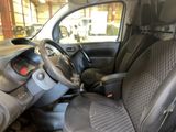 the interior of a car with a steering wheel and a dashboard