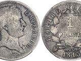 a close up of a coin on a white background