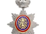 l'image d'une médaille surmontée d'une couronne
