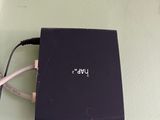 a black box with wires attached to it sitting on a table