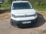 a white van parked on the side of the road