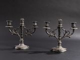 pair of antique silver plated candelabs on stand
