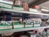 many different types of tools on the shelves in the store