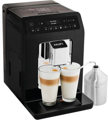 gros plan d'une machine à café avec deux tasses de café