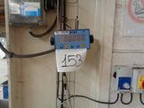 an image of a meter in a building with a sign on it