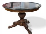 une image d'une table avec un plateau en verre sur un fond blanc