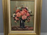 peinture d'un vase de fleurs sur une table dans un cadre doré