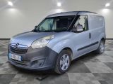 a picture of a silver van parked in a room