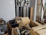 a room with a lot of boxes and a table in it