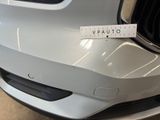 a picture of a car with a sticker on the front of it