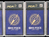 three packs of one piece one piece card game cards in clear plastic cases