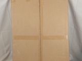 two cardboard boxes stacked on top of each other on a white surface
