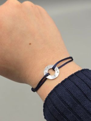 DINH VAN Bracelet sur cordon "cible" en or blanc 750°° (gran…