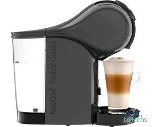 a close up of a coffee machine with a cup of coffee