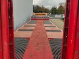 the back end of a semi trailer with the door open