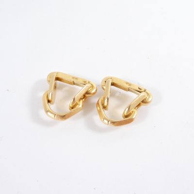pair of gold plated earrings on a white background