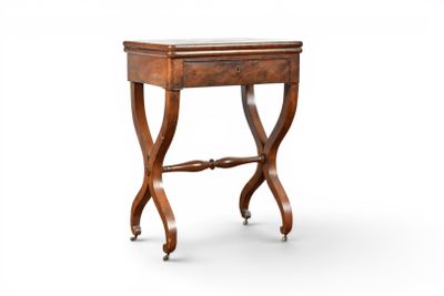an image of a small wooden table with a drawer underneath it