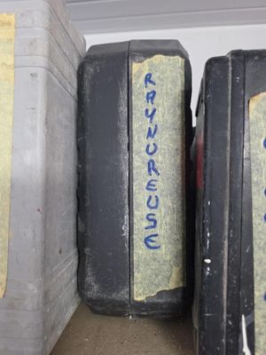 three suitcases that are sitting next to each other on a shelf