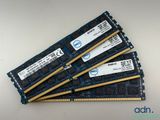 a group of four memory modules sitting on top of each other