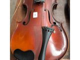 a violin that is sitting on a table