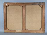 an old wooden frame with two panels and a plaque on it