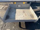 an image of a metal work cart on the ground