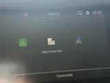 the dashboard of a car with a car radio and an app connected to it