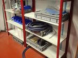 a shelf with a bunch of electronics on top of it